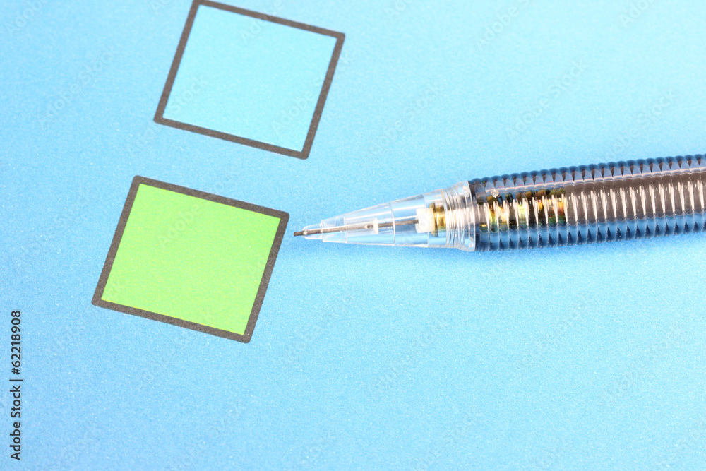 Mechanical pencil point to Green Checkbox on blue background. Mechanical pencil point to Green Checkbox on blue background.