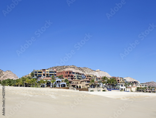 colorful village on the beach © gdvcom