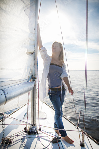 woman staying on sailboat