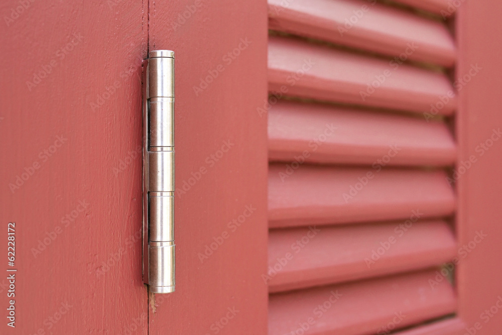 stainless steel hinges on rustic wooden shutter window stainless steel hinges on rustic wooden shutter window