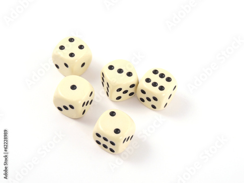 Close up photo of five dice on a white background.