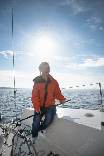 Woman sailing on the yacht