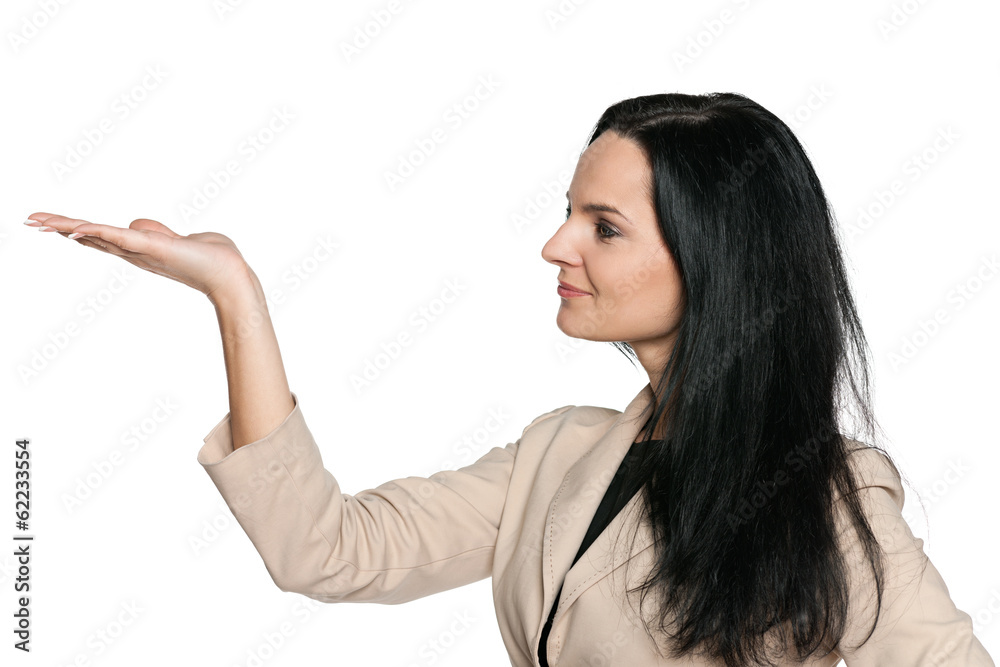 Pretty woman looks on her palm Pretty woman looks on her palm