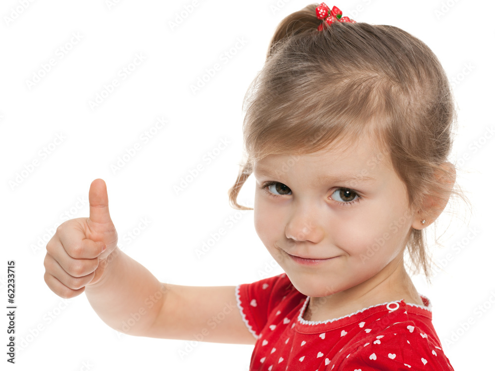 Little girl in red blouse holds her thumb up Little girl in red blouse holds her thumb up