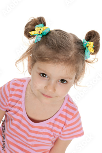 Thoughtful preschool girl against the white
