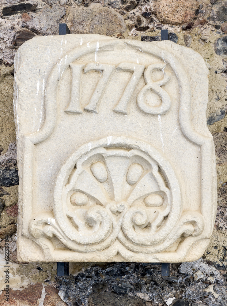 stone slab engraved with the year 1778. Poblet