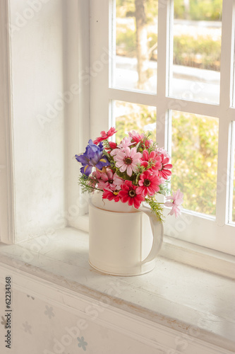 flowers in  vase for decorated home  with sun light