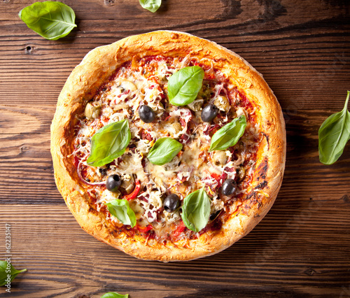 Fresh italian pizza on wood #62235147