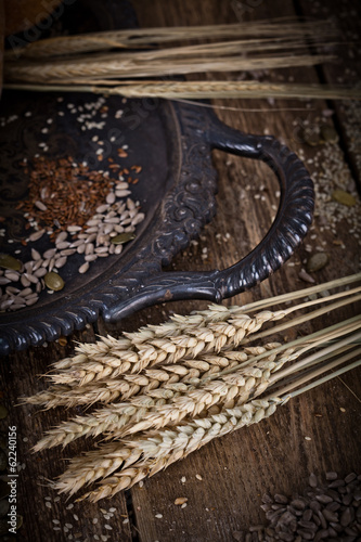 fresh bread and wheat on the wooden - rustic