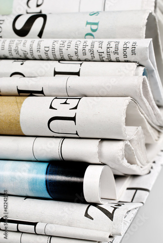 Stack of folded newspapers