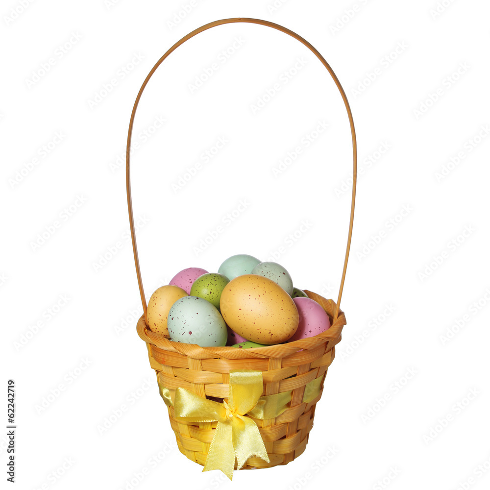 Easter basket with colorful eggs isolated on white Easter basket with colorful eggs isolated on white