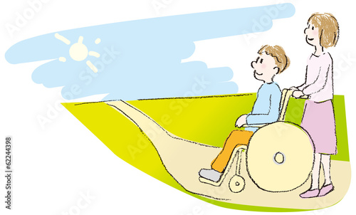 車いすの人と介助者
