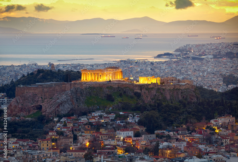 Athens, Greece. After sunset.  Parthenon and Herodium constructi