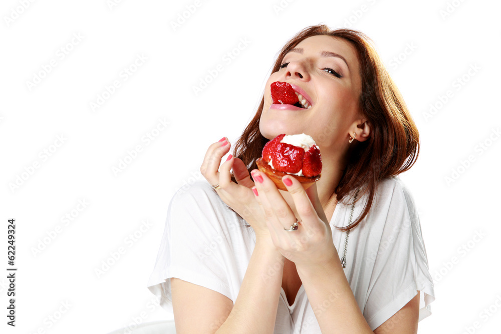 Charming woman eating fresh strawberry cake Charming woman eating fresh strawberry cake