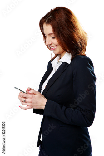 Smiling businesswoman holding smartphone