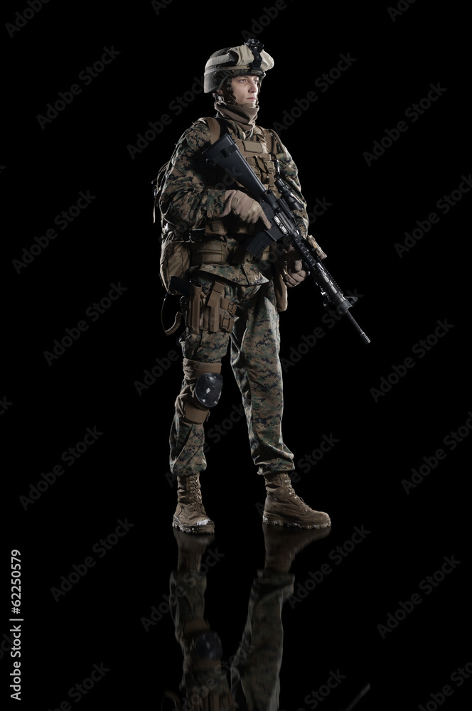 Fototapeta premium U.S. marine. American soldier. Isolated on black.
