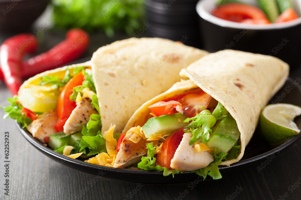 mexican tortilla wrap with chicken breast and vegetables - obrazy, fototapety, plakaty 