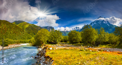Fantastic landscape with a blue river in the mountains