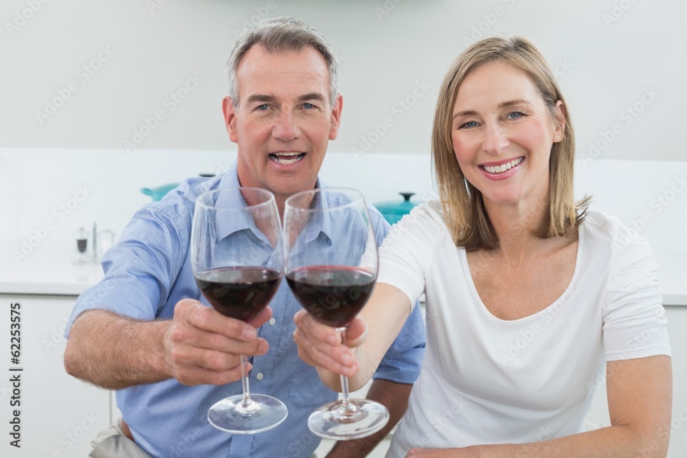 Portrait of a couple holding wine glasses Portrait of a couple holding wine glasses