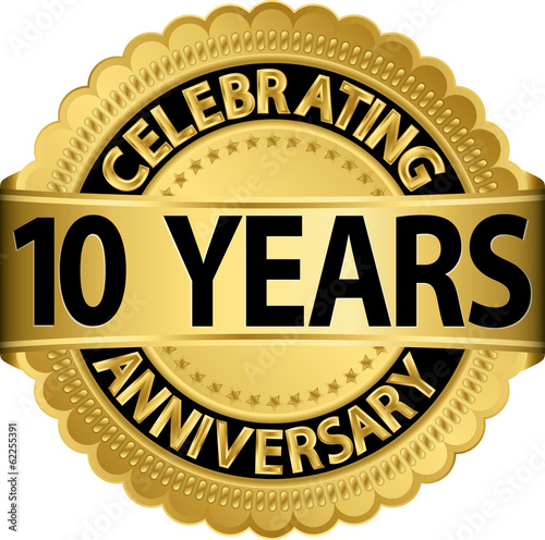 Celebrating 10 years anniversary golden label with ribbon, vecto