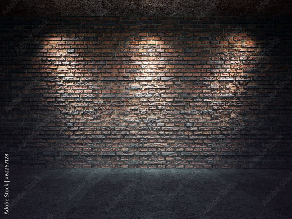 Old brick wall illuminated by spotlights