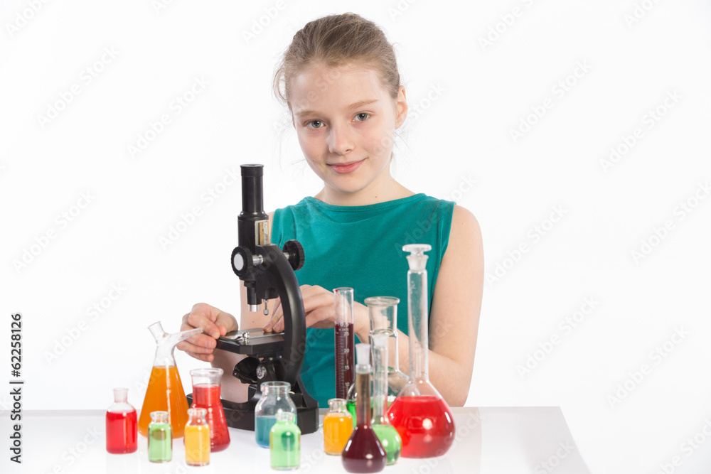 Child in chemistry class, chemistry lesson Child in chemistry class, chemistry lesson