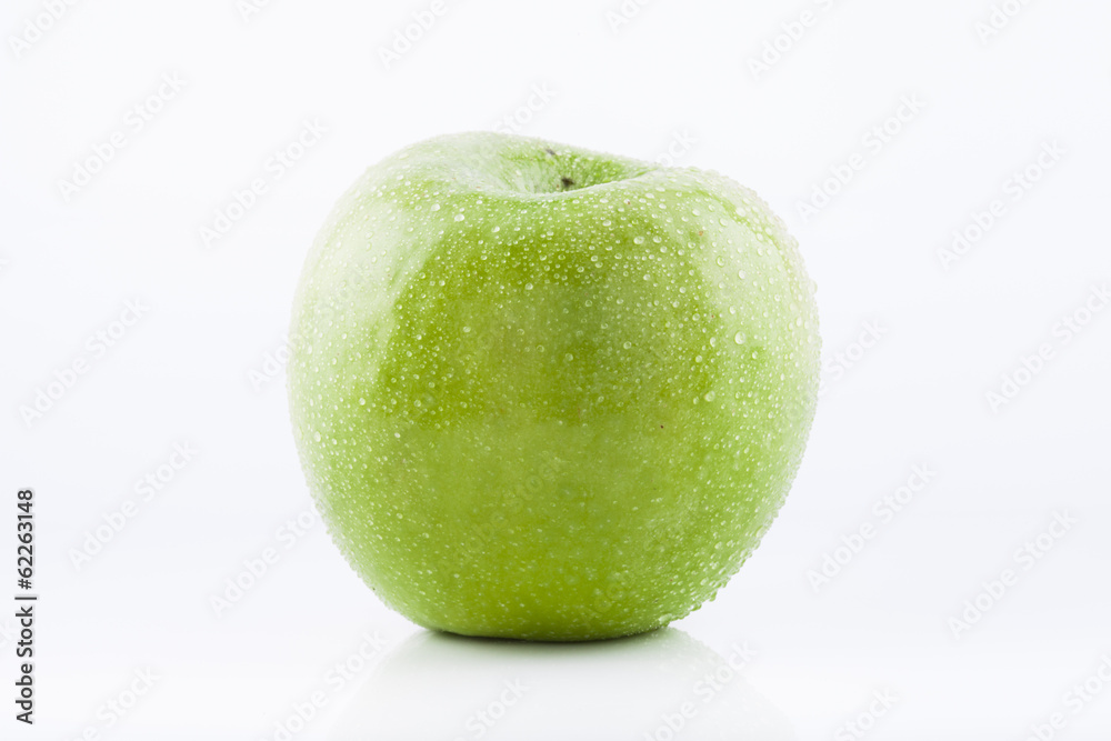 Green Granny Smith apple with waterdrops Green Granny Smith apple with waterdrops