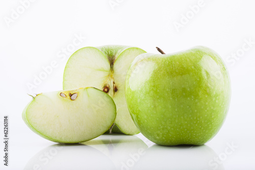 Green Granny Smith apple with waterdrops