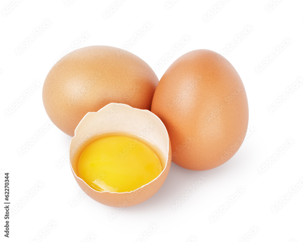 raw chicken eggs one open with yolk raw chicken eggs one open with yolk