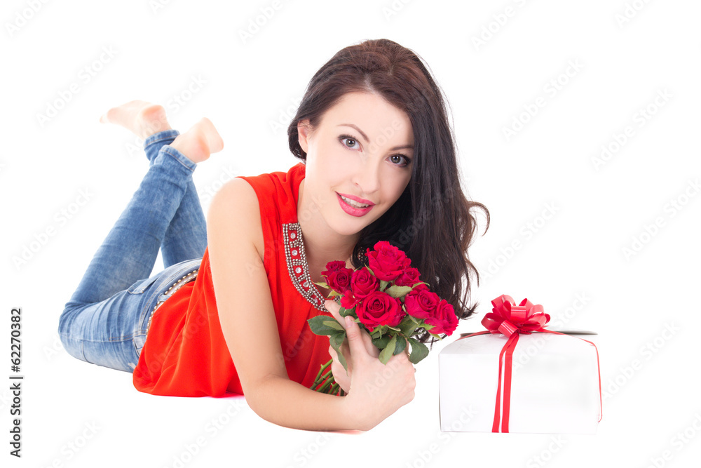 beautiful woman lying with gift box and flowers isolated on whit beautiful woman lying with gift box and flowers isolated on whit