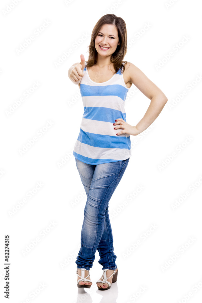 Beautiful young woman smiling with thumbs up Beautiful young woman smiling with thumbs up