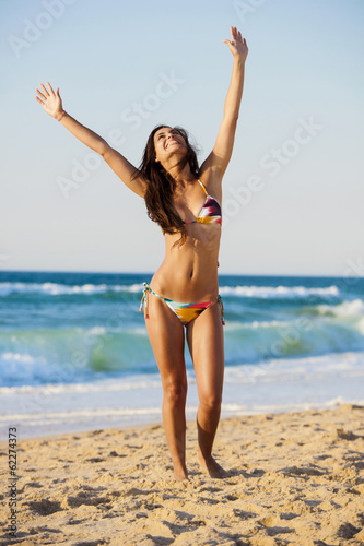 Sexy and beautiful woman posing in bikini