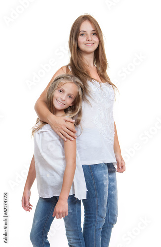 young mum and daughter or sister