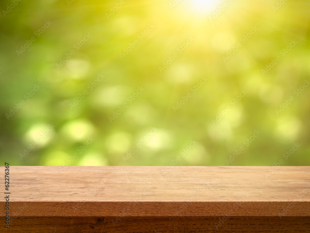 Table on Bokeh Foliage with Sun Table on Bokeh Foliage with Sun
