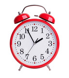 Red alarm clock on white background