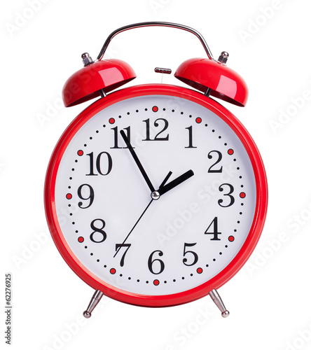 Red alarm clock on white background photo