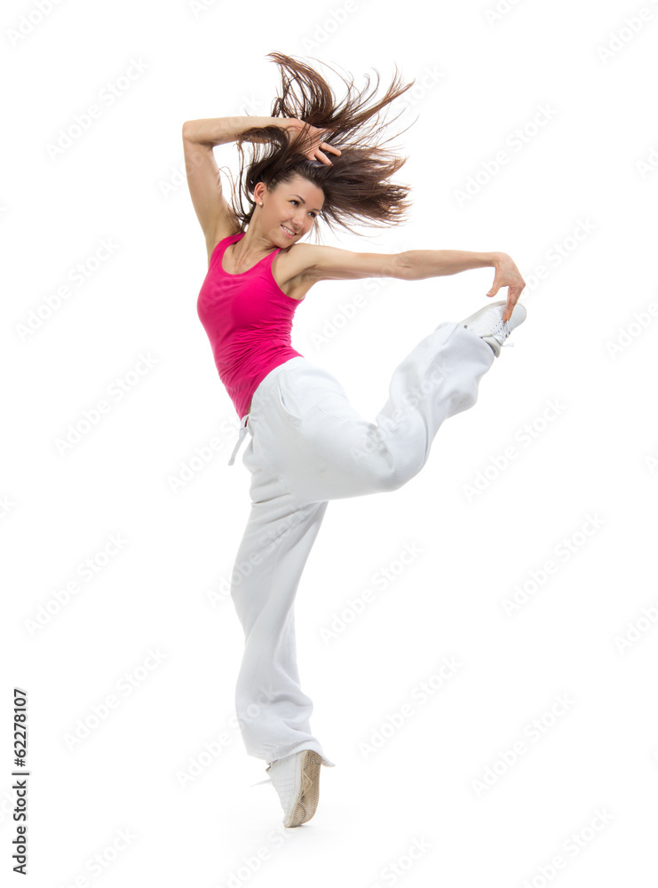 Pretty modern slim hip-hop style teenage girl jumping dancing