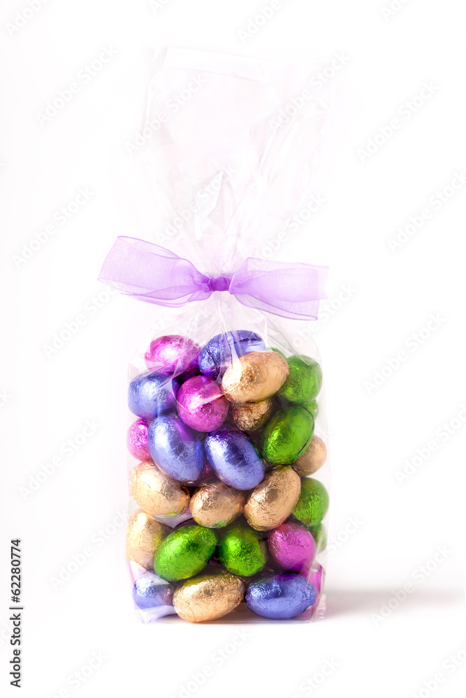 Obraz premium Chocolate mini eggs in a cellophane bag
