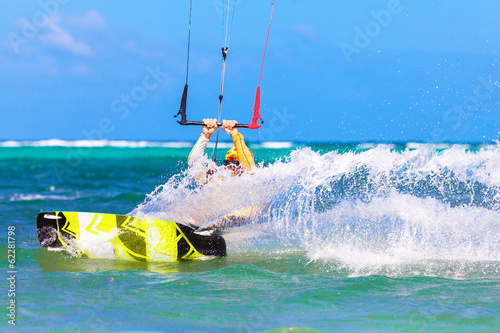 young kitesurfer on sea background Extreme Sport Kitesurfing