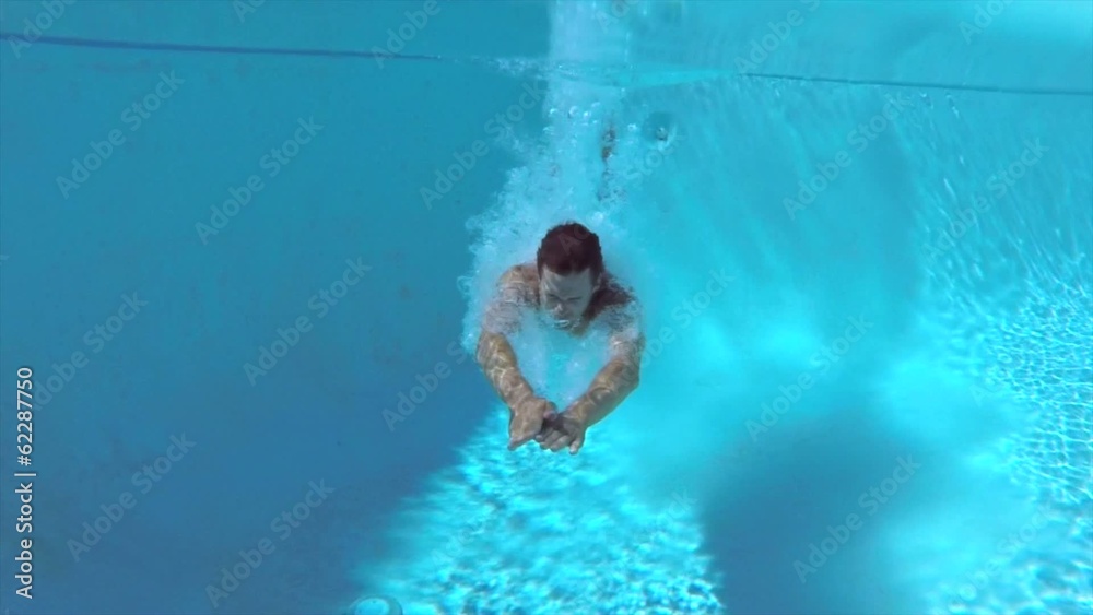 Dive in swimming pool