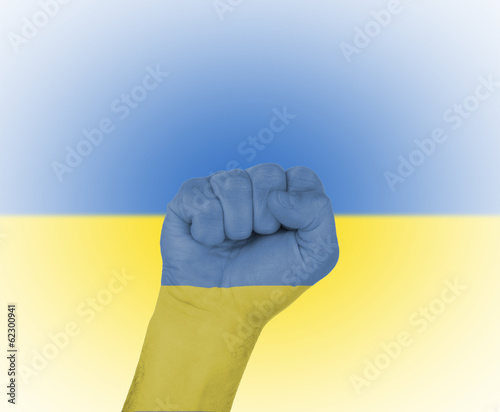Fist wrapped in the flag of the Ukraine