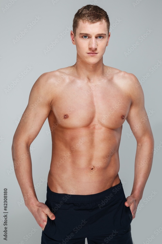 Handsome young man with muscular torso