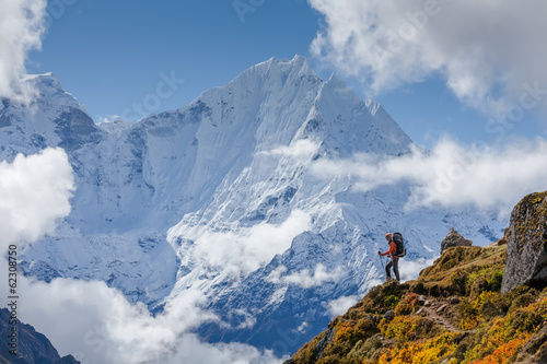 Hiker walks on train in Himalayas © Maygutyak