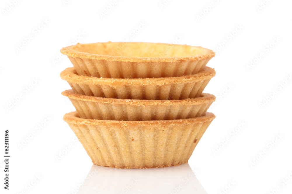 Stack of empty tartlets on white Stack of empty tartlets on white