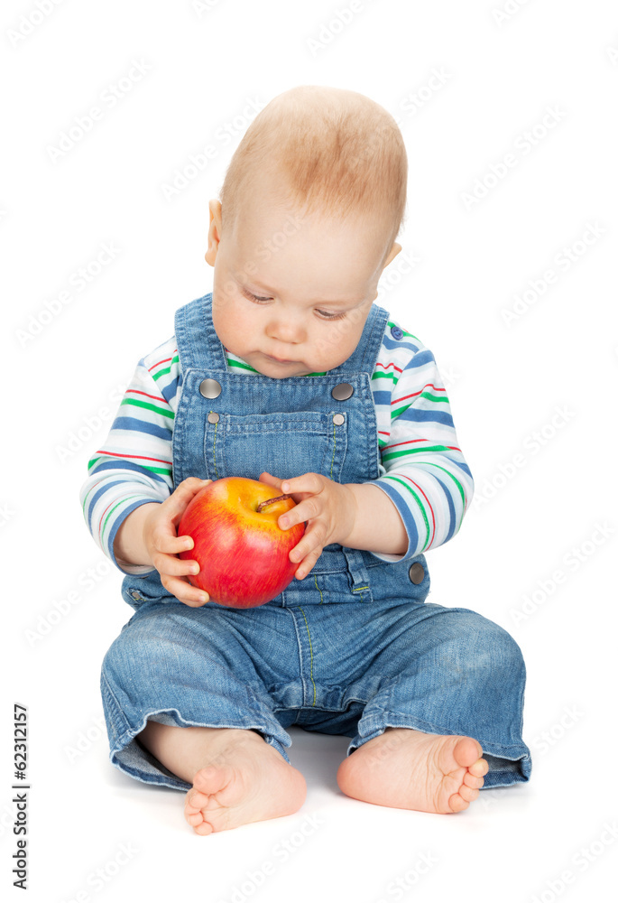 Small baby boy holding an apple Small baby boy holding an apple