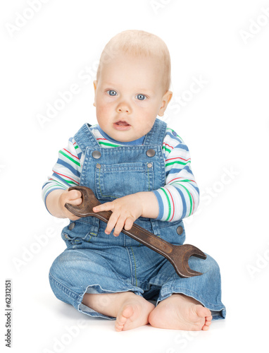 Small cute baby boy worker in jeans