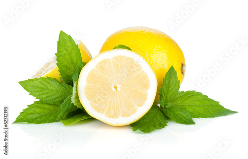 Three ripe lemons and mint photo