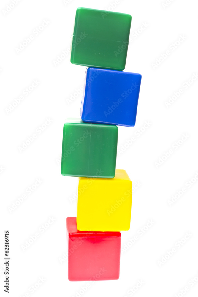 Children's Pyramid from Color Cubes Isolated on White Background Children's Pyramid from Color Cubes Isolated on White Background