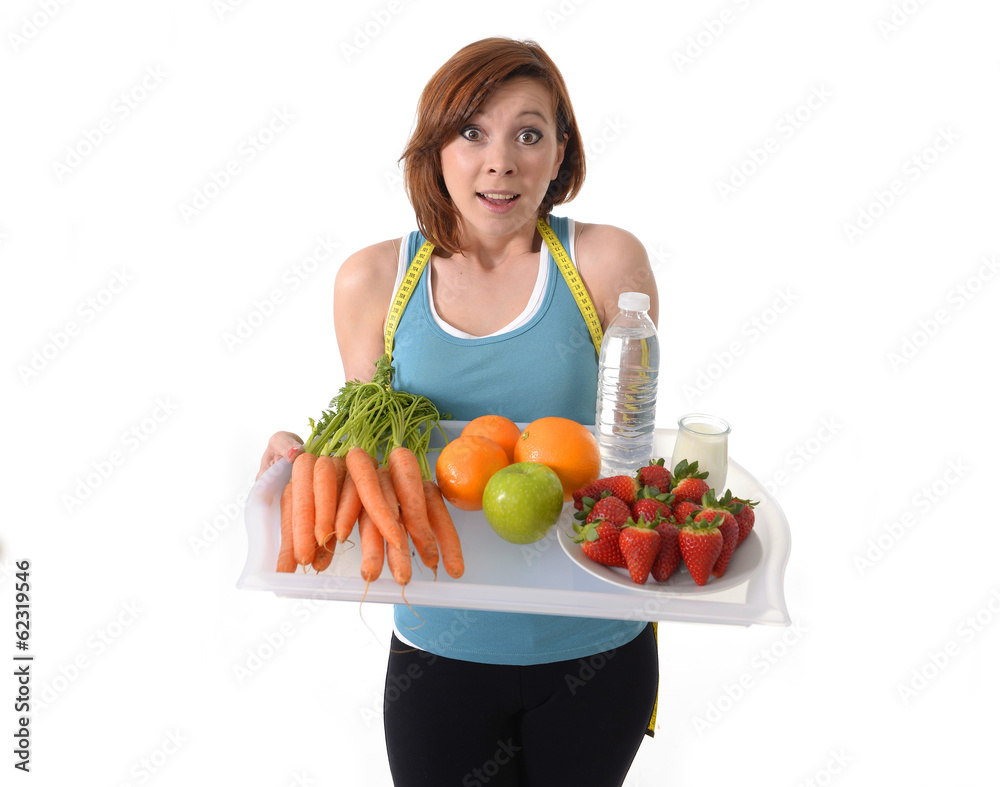 Young attractive red hair woman with healthy fruit tray Young attractive red hair woman with healthy fruit tray