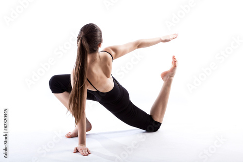 A fit woman stretching her body